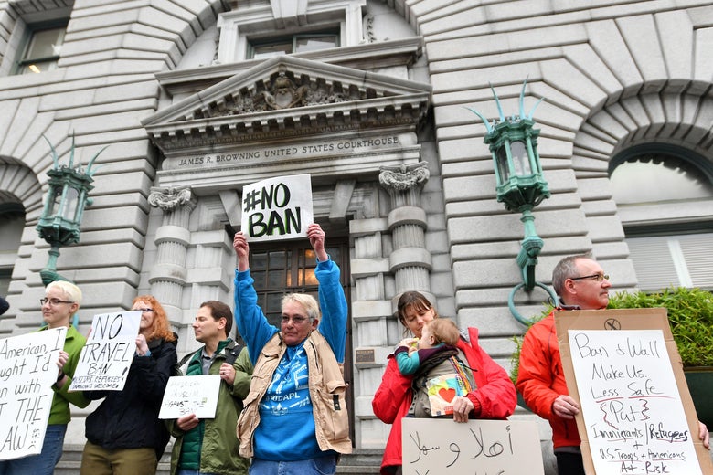 Protesters stand in front of the United States Court of Appeals for the Ninth Circuit in San Francisco, California on February 7, 2017.
A federal appeals court heard arguments on Tuesday on whether to lift a nationwide suspension of President Donald Trump's travel ban targeting citizens of seven Muslim-majority countries. / AFP / Josh Edelson (Photo credit should read JOSH EDELSON/AFP/Getty Images)
